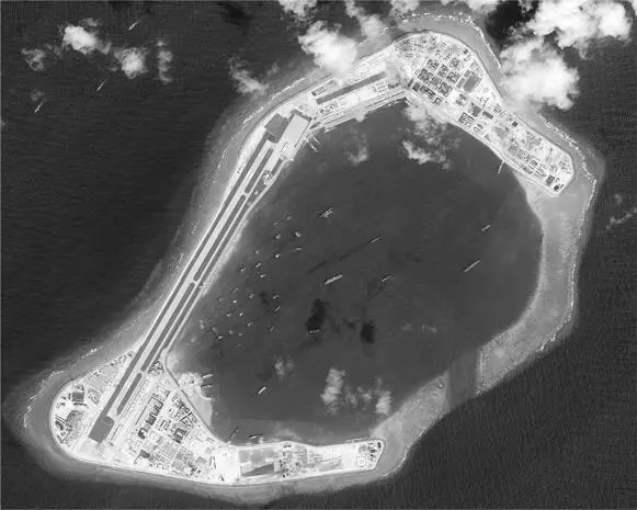 Китай освоил 3200 акров территории в ЮжноКитайском море превратив их в - фото 38