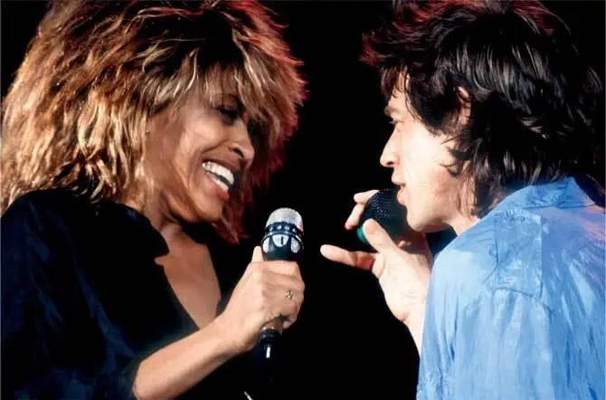 С глазу на глаз с Миком Джаггером на Live Aid Getty Images Ухватилась за - фото 27