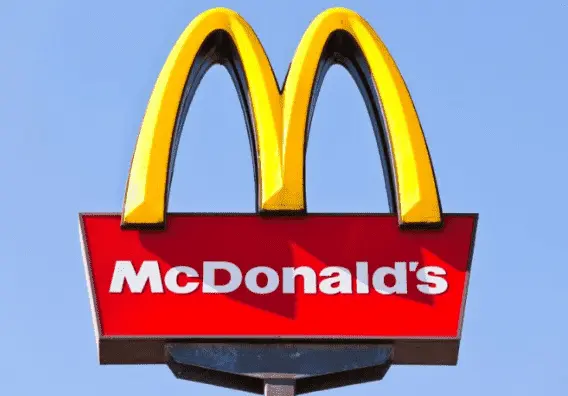 На фото Символ McDonalds Corporation легендарные золотые арки Примечания 1 - фото 51