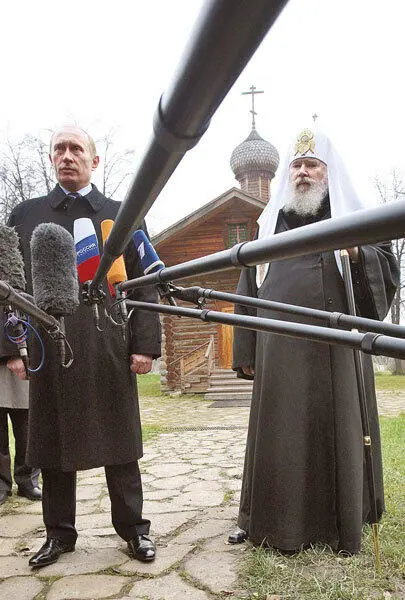 Патриарх Алексий был немногословен Подарили тигренка А хорошо когда - фото 7