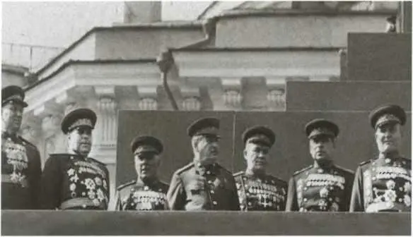 И В Сталин и маршалы Советского Союза на трибуне мавзолея Парад Победы - фото 49