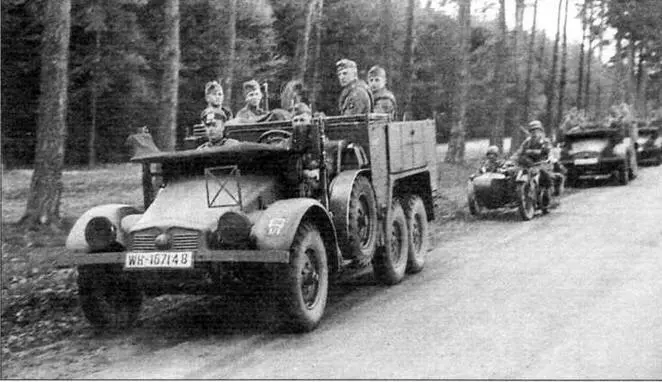 Автомобиль Krupp L2H143 Kfz 70 в составе маршевой колоны на лесной дороге в - фото 7
