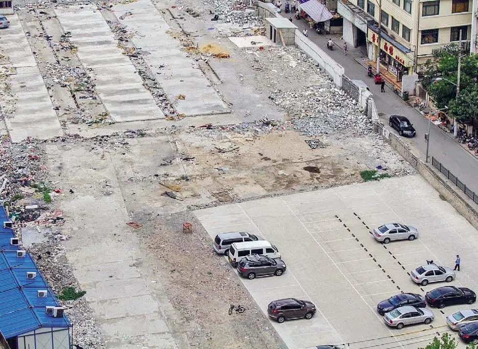 На месте трущоб уже организовали парковку Старинный Шанхай уничтожают Сперва - фото 23