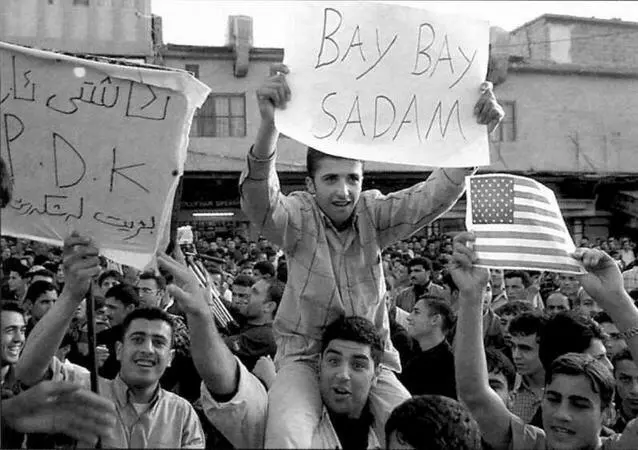 Многие в Ираке были рады американобританскому вторжению как например эти - фото 17