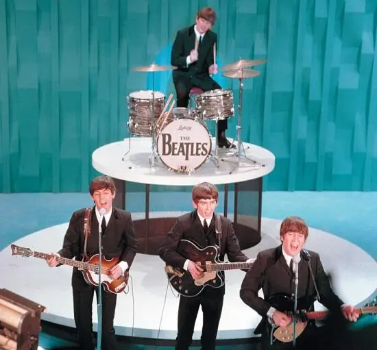 The Beatles появились в программе Ed Sullivan Show на американском телевидении - фото 48