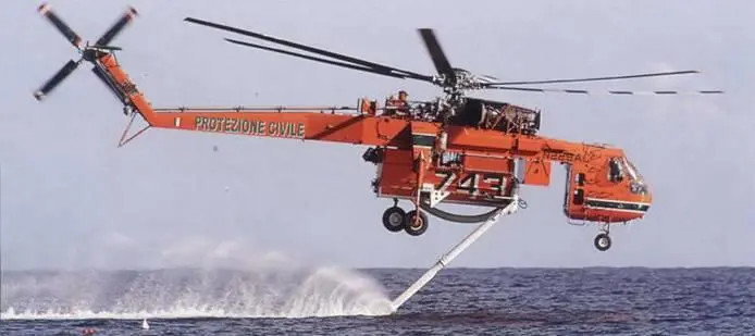 Вертолет S64E Skycrane американской фирмы Ericksen Air Crane производит забор - фото 93