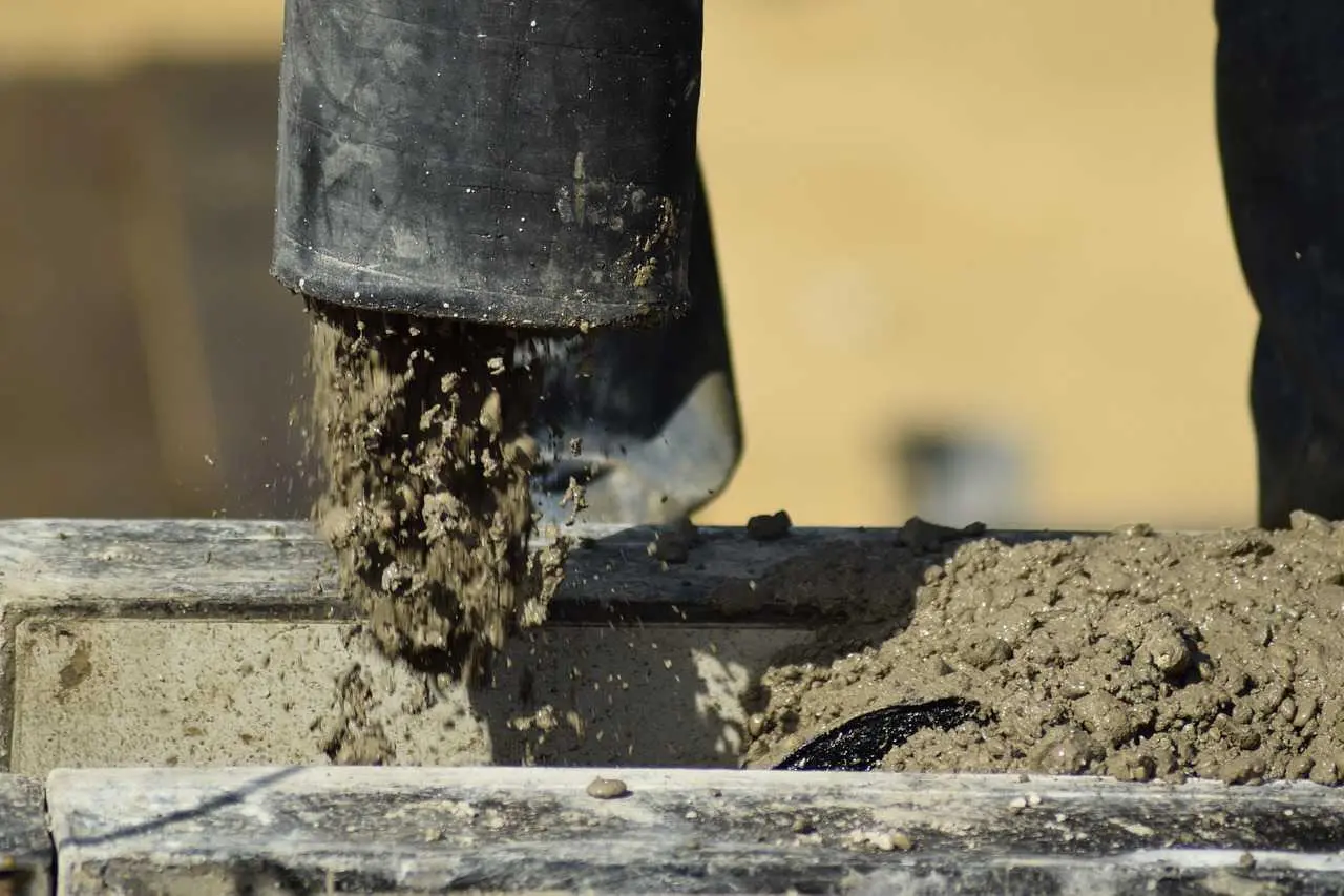 Figure 151 Five of Disks Source of Matter Pouring concrete at a - фото 42