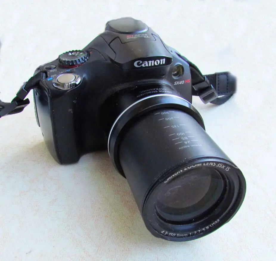 Canon SX 40 HS Тем не менее техника камер с зумом стремительно развивается В - фото 3
