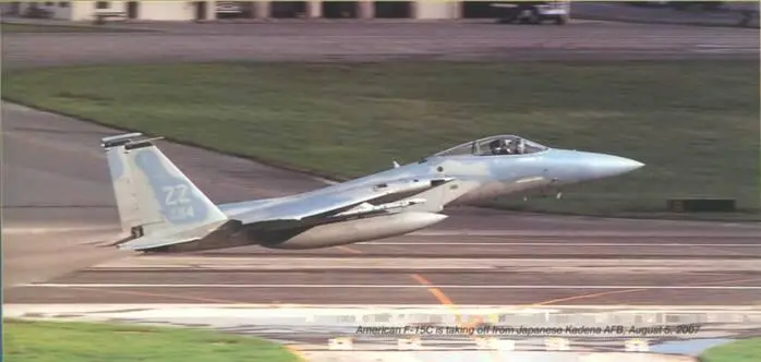 Американский F15С взлетает с японской авиабазы Кадена 5 августа 2007 г - фото 72