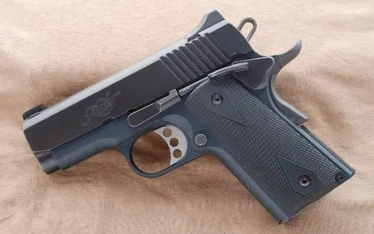 Пистолет Kimber Ultra Carry II имеет затворкожух из углеродистой стали с - фото 392