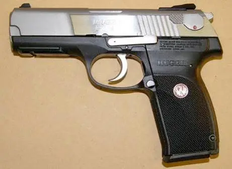 Пистолет Ruger P345 калибра 1143мм имеет малую толщину и плавные обводы без - фото 446