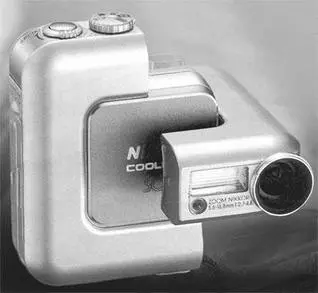 Рис 715Фотоголоволомка Nikon Coolpix SQ А этот небольшой серебристый - фото 163