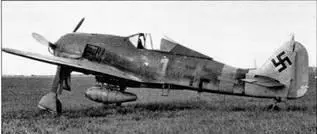 Этот самолет Fw 190А8 принадлежавший JG 1 был сфотографирован в Германии - фото 47