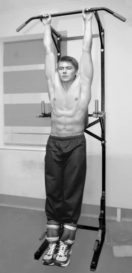 Рис 35Вис на турнике с утяжелителями для ног Начните выполнять подъемы ног с - фото 7