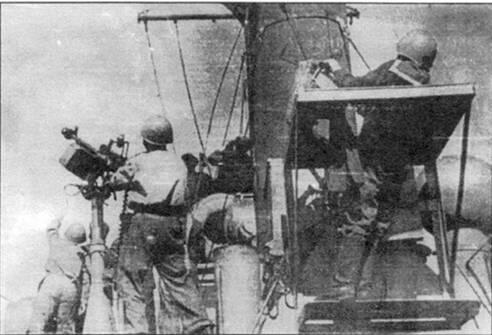 Корабельная тумбовая установка пулемета ДШК ведет огонь по воздушной цели К - фото 2