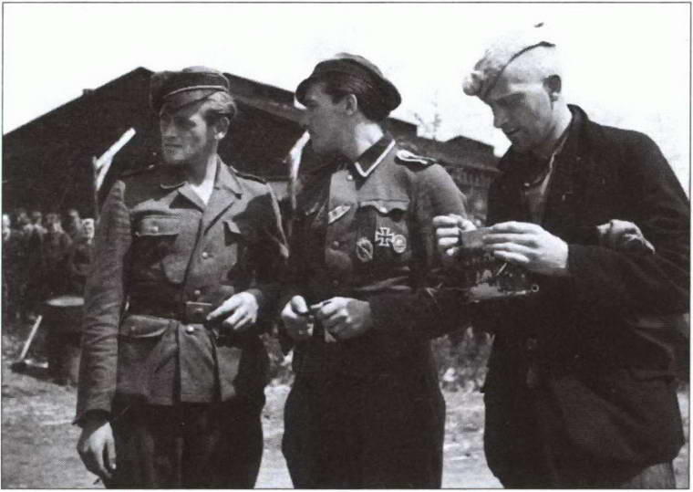 Три голландских эсэсовца в лагере военнопленных Освобождение Вены - фото 54