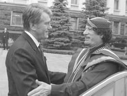 Виктор Ющенко и Муаммар Каддафи Если первое поколение горожан переселившееся - фото 4